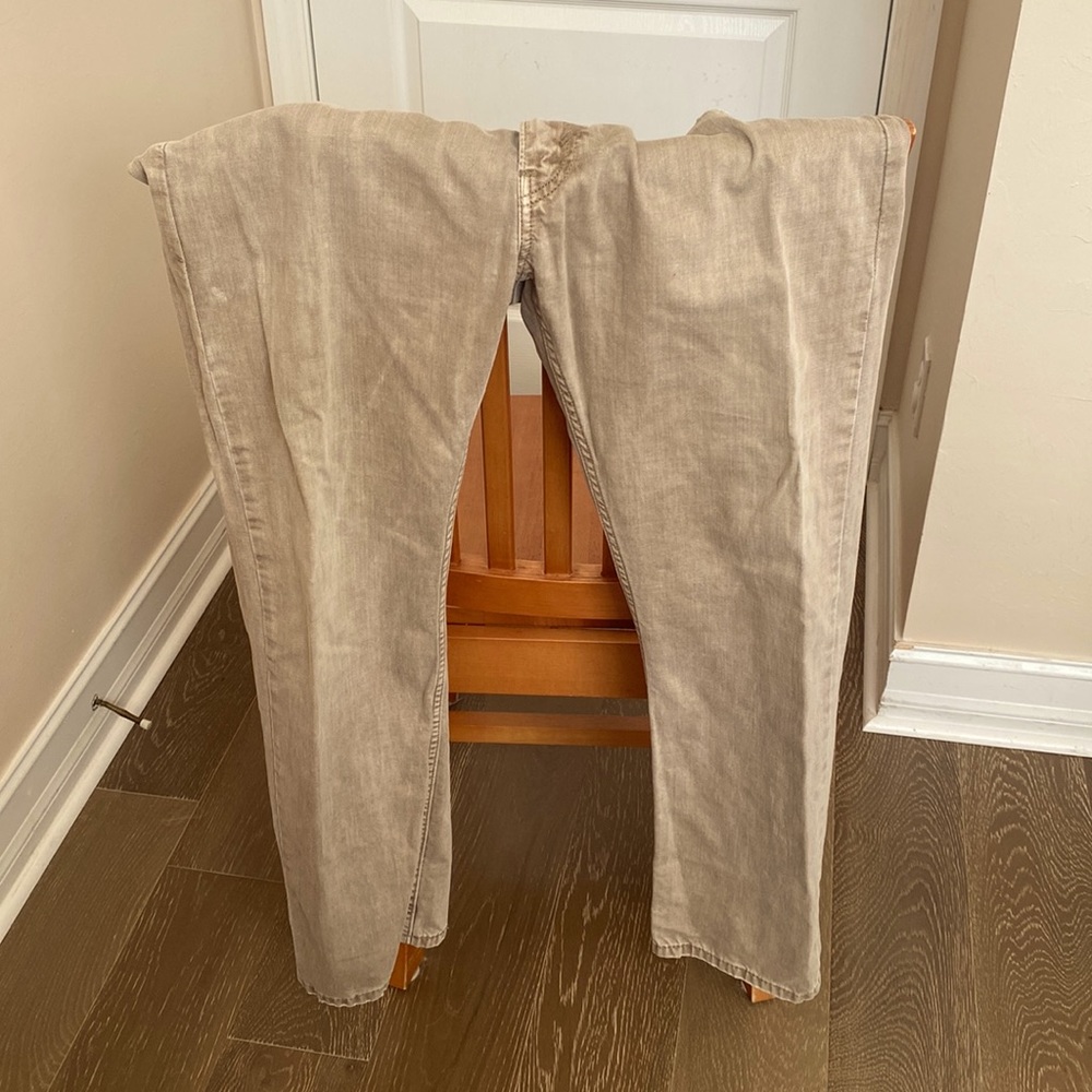 Beige pair of Levi Strauss jeans
